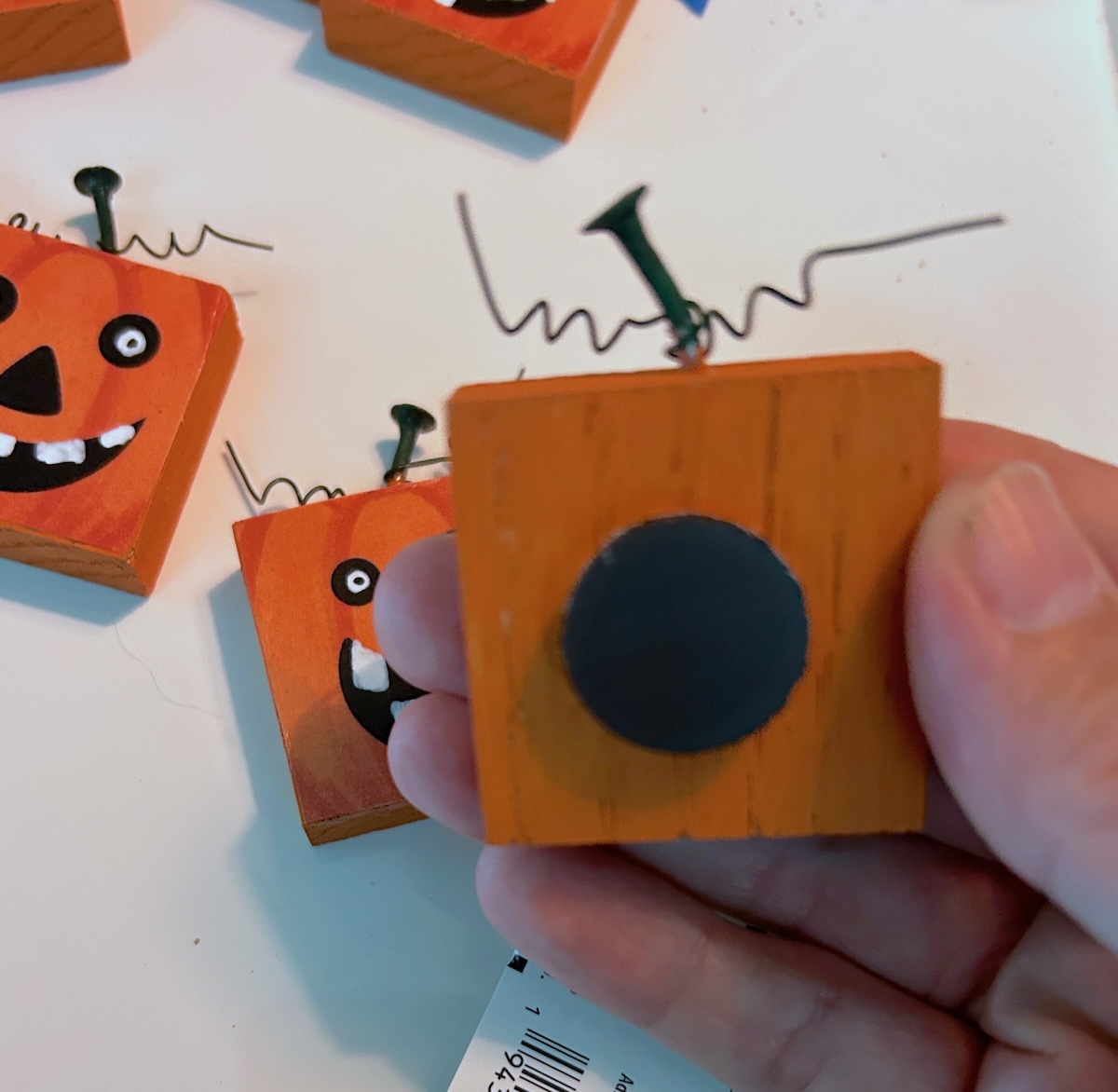 adding magnets to the back of the pumpkins