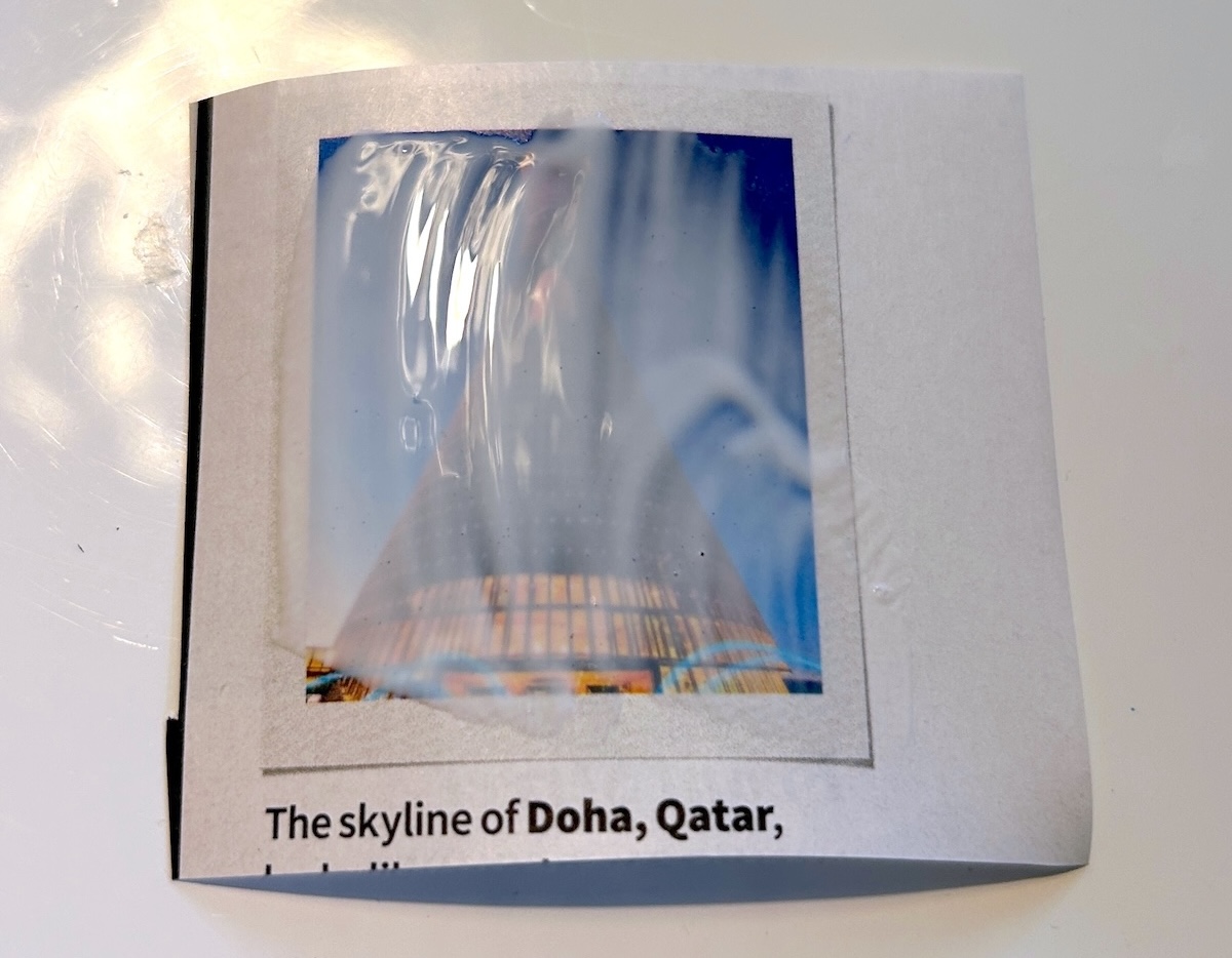 applying Mod Podge to the magazine photo