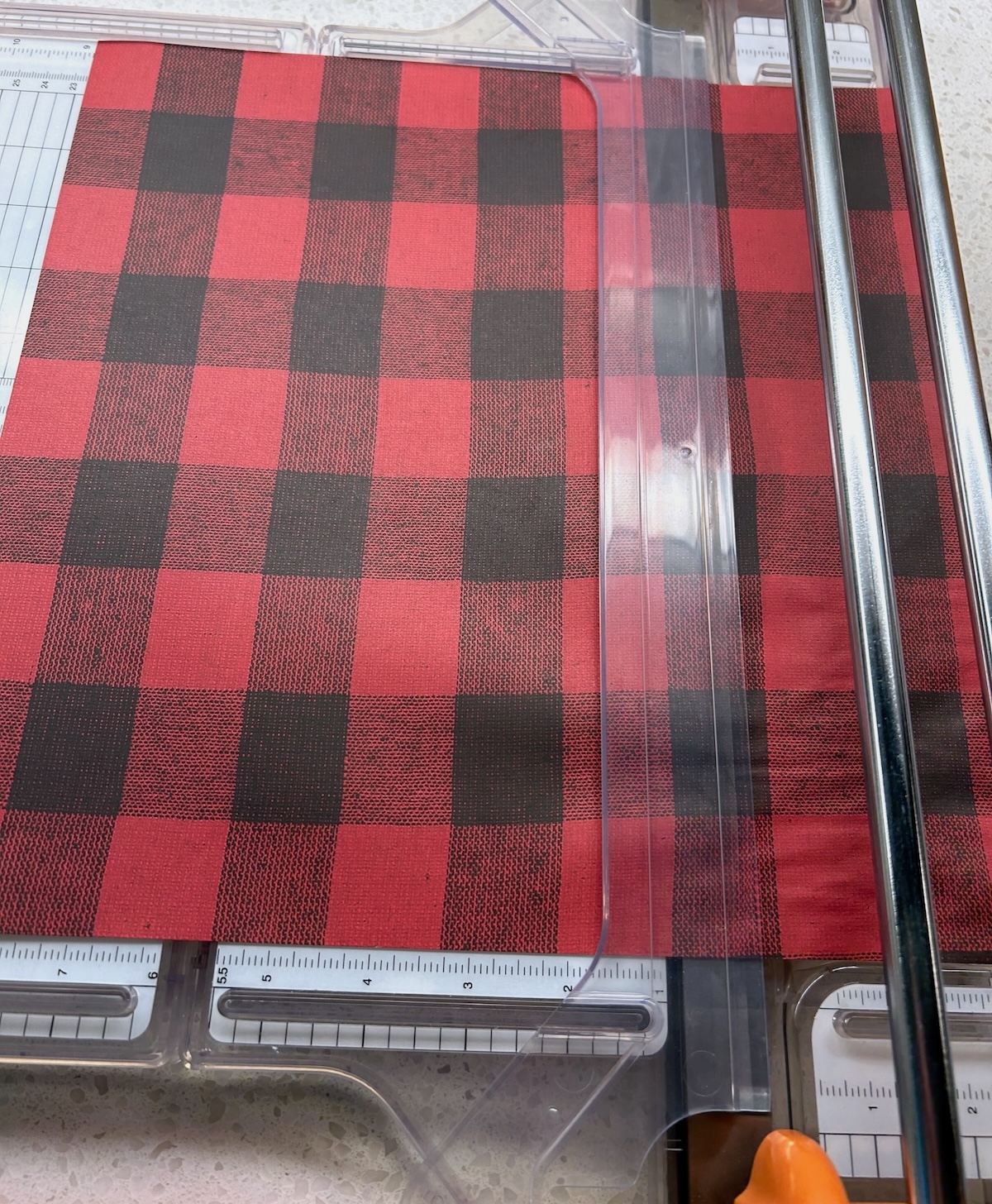 cutting buffalo plaid with a paper cutter