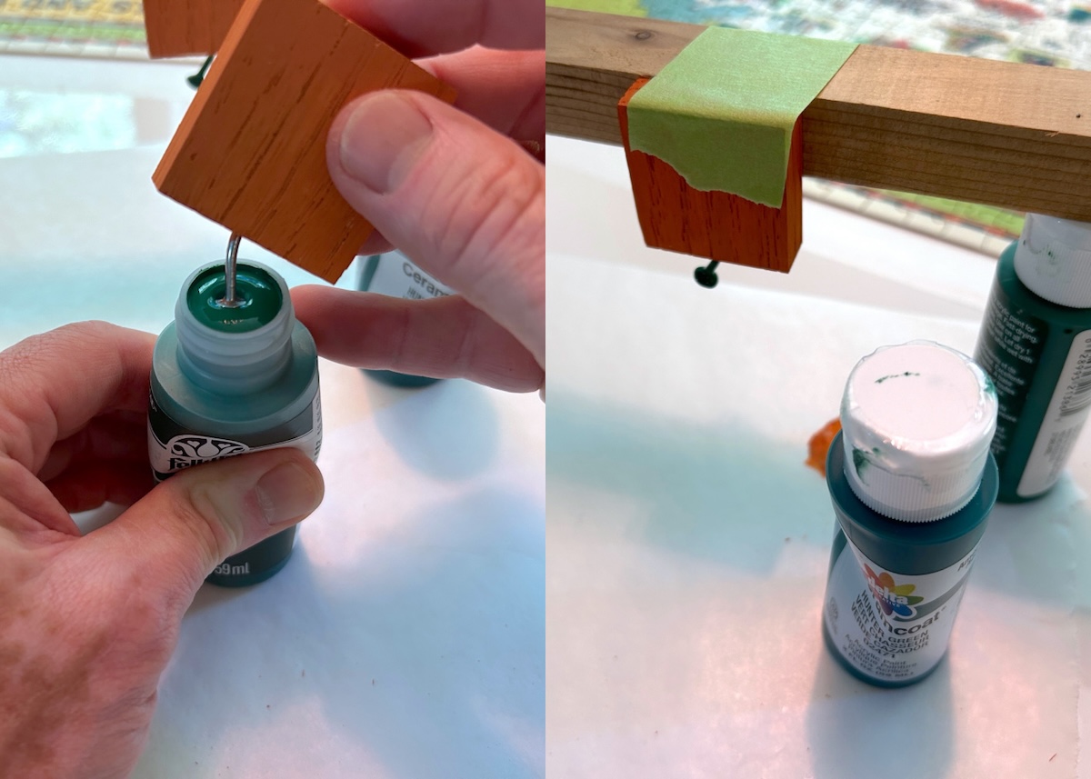 painting the nail with green paint