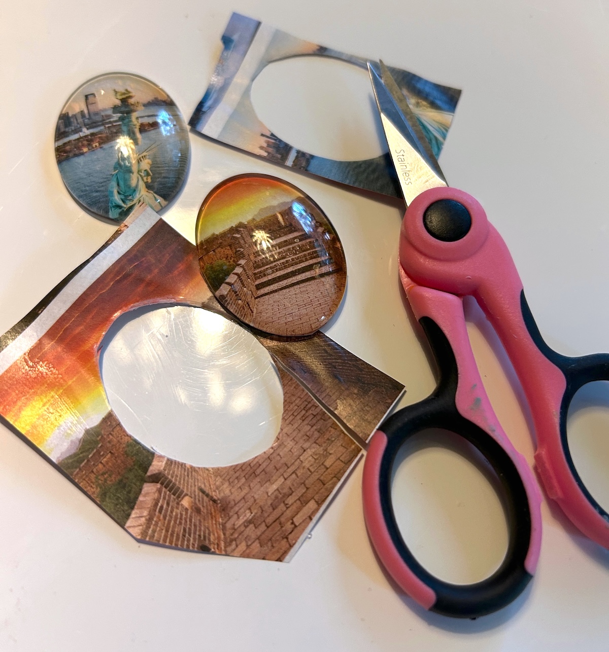 trimming the excess magazine pages off with detail scissors