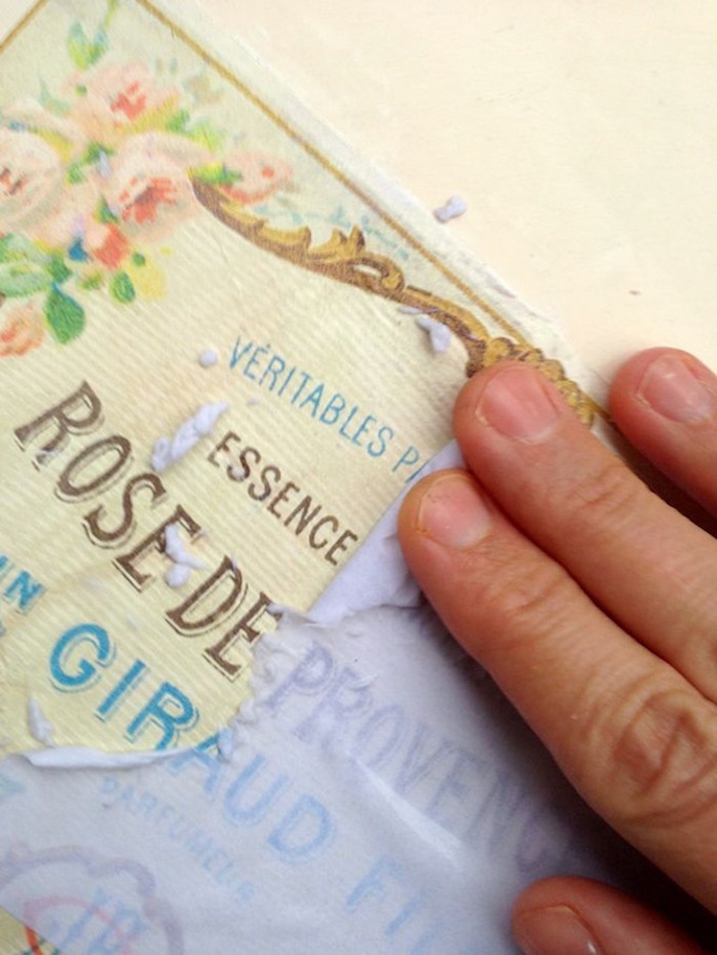 Hand rubbing the paper off an image transfer